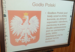 Slajd prezentacji z godłem państwowym Polski