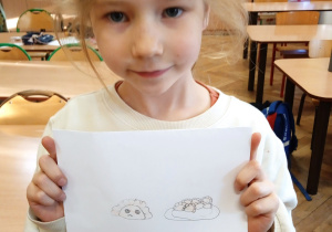 Uczennica ze swoją pracą